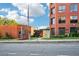 Brick office building featuring an American flag, well-maintained landscaping, and ample parking at 1521 Deerwood Dr, Decatur, GA 30030