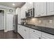 Well-lit kitchen with stainless steel appliances, gas stove, and plenty of counter space at 1850 Overlook Springs Ln, Cumming, GA 30040