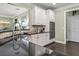 Well-appointed kitchen with a breakfast bar, double ovens, and ample cabinet space at 1850 Overlook Springs Ln, Cumming, GA 30040