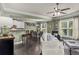 Open-concept living room showcasing the kitchen, dining area, and cozy seating at 1850 Overlook Springs Ln, Cumming, GA 30040