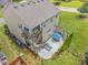 Two-story home featuring an outdoor patio, tiered deck, and a well-kept backyard at 1850 Overlook Springs Ln, Cumming, GA 30040