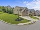 Suburban two-story home on a cul-de-sac with a well-maintained lawn and concrete driveway at 1850 Overlook Springs Ln, Cumming, GA 30040