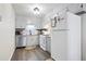 Well-lit kitchen featuring stainless steel appliances, granite countertops, and ample cabinet space at 189 Timber Creek Ln, Marietta, GA 30060