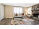Cozy living room with a stone fireplace, soft lighting, and comfortable seating at 189 Timber Creek Ln, Marietta, GA 30060