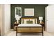 Cozy bedroom with natural lighting and neutral decorations at 2340 Treaty Ln, Douglasville, GA 30135