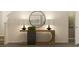 Modern entryway table with a sleek mirror at 2340 Treaty Ln, Douglasville, GA 30135