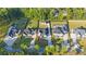 Luxury home aerial showing a pool, guest house, long driveway, and lush green lawns at 2631 Sardis Way, Buford, GA 30519