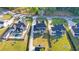 Luxury home aerial showing a pool, white fence, long driveway, and lush green lawn at 2631 Sardis Way, Buford, GA 30519