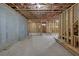Unfinished basement with concrete floor, framed walls, and exposed ceiling, ready to be finished at 2631 Sardis Way, Buford, GA 30519