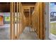Unfinished basement space showcasing exposed framing and concrete flooring at 2631 Sardis Way, Buford, GA 30519