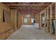 Expansive unfinished basement with concrete flooring, and wood framing, offering versatile space for customization at 2631 Sardis Way, Buford, GA 30519