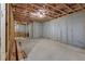 Spacious unfinished basement with concrete floor, exposed beams, and wood framing, offering a blank canvas at 2631 Sardis Way, Buford, GA 30519