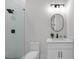 Modern bathroom featuring a glass enclosed shower and a stylish vanity with granite counters at 2631 Sardis Way, Buford, GA 30519