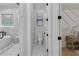 Modern bathroom with separate rooms for the toilet, shower, and bathtub at 2631 Sardis Way, Buford, GA 30519