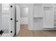 This bathroom and closet boasts modern fixtures, a spacious shower, and ample storage space at 2631 Sardis Way, Buford, GA 30519