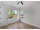 Bright bedroom with hardwood floors and views from the window at 2631 Sardis Way, Buford, GA 30519