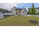 Stunning two-story home with a manicured lawn and elegant landscaping at 2631 Sardis Way, Buford, GA 30519
