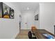 Bright hallway featuring modern artwork, recessed lighting, and views of other living spaces at 2631 Sardis Way, Buford, GA 30519