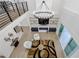 This living room has high ceilings, a modern chandelier, and an electric fireplace at 2631 Sardis Way, Buford, GA 30519