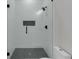 Modern shower featuring stylish black fixtures and modern tiling at 2631 Sardis Way, Buford, GA 30519