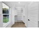 Well-organized walk-in closet with shelving and a view of the outdoors at 2631 Sardis Way, Buford, GA 30519