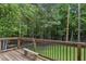 Outdoor deck offers seating and wooded views at 735 Poplar Rd, Dallas, GA 30157