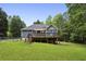 Expansive backyard features a spacious deck perfect for outdoor entertaining and relaxation at 735 Poplar Rd, Dallas, GA 30157