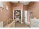 Bedroom view showcasing a well-organized closet and decor at 735 Poplar Rd, Dallas, GA 30157