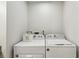 Convenient laundry room with washer, dryer, and storage at 735 Poplar Rd, Dallas, GA 30157