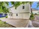 Back of home featuring walkout basement, a concrete patio, and landscaped yard providing a perfect outdoor space at 791 E Main Street, Canton, GA 30114