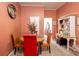 Cozy dining area featuring a round table, padded chairs, and stylish hutch for storage at 791 E Main Street, Canton, GA 30114