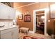Bright, updated kitchen features white cabinets and is adjacent to the dining room at 791 E Main Street, Canton, GA 30114
