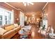 Open concept living room featuring hardwood floors, comfortable seating, and lots of natural light at 791 E Main Street, Canton, GA 30114
