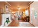 Elegant living room with fireplace, hardwood floors, and bright, natural lighting at 791 E Main Street, Canton, GA 30114