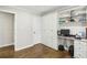 Cozy office boasts hardwood floors, built-in storage, and a functional desk space at 119 Laurel Mill Ct, Roswell, GA 30076