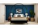 Stylish bedroom with a modern black four-poster bed, contemporary decor, and a serene ambiance at 2483 Cotton Ln, Douglasville, GA 30135
