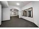 A large finished basement area with neutral colors and dark trim at 685 Sienna Dr, Cumming, GA 30040