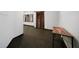Finished basement area with neutral walls and trim and a table at 685 Sienna Dr, Cumming, GA 30040
