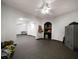 Spacious finished basement area with a storage safe and multiple entryways at 685 Sienna Dr, Cumming, GA 30040