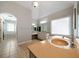 Bright bathroom featuring double vanity, tub with chrome fixtures and natural light at 685 Sienna Dr, Cumming, GA 30040