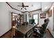 Home office with a large desk and ample natural light at 685 Sienna Dr, Cumming, GA 30040