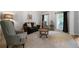 Cozy living room with comfortable seating, neutral tones, and large windows for natural light at 685 Sienna Dr, Cumming, GA 30040