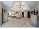 Spacious main bedroom with tray ceilings, neutral paint, bathroom and walk in closet at 685 Sienna Dr, Cumming, GA 30040