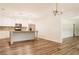 Bright kitchen featuring stainless steel appliances, island, and open layout at 8394 Banks Mill Rd, Douglasville, GA 30135