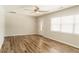 Spacious living room with ample natural light and hardwood flooring at 8394 Banks Mill Rd, Douglasville, GA 30135