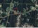 Aerial lot map showing the property boundaries in a neighborhood surrounded by lush greenery at 8394 Banks Mill Rd, Douglasville, GA 30135