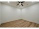 Light and airy bedroom with hardwood floors, recessed lighting and a ceiling fan at 912 Oak Dr, Woodstock, GA 30189