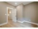 Comfortable bedroom featuring wood-look flooring, and a doorway leading to another room at 912 Oak Dr, Woodstock, GA 30189
