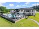 Stunning aerial view of the home, highlighting the pool, outdoor entertaining spaces, and landscaped grounds at 1336 Azalea Dr, Lawrenceville, GA 30043