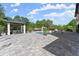 Extensive backyard featuring a pool, spa, gazebo, and ample patio space, ideal for relaxation at 1336 Azalea Dr, Lawrenceville, GA 30043